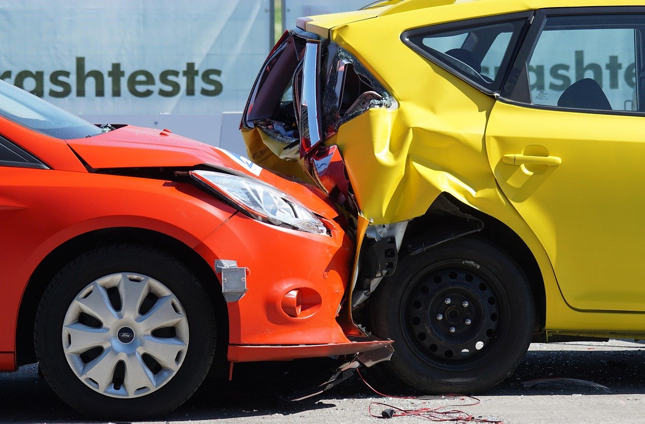 Who is at fault in a rear end collision, two cars after a rear-end crash on an Atlanta road